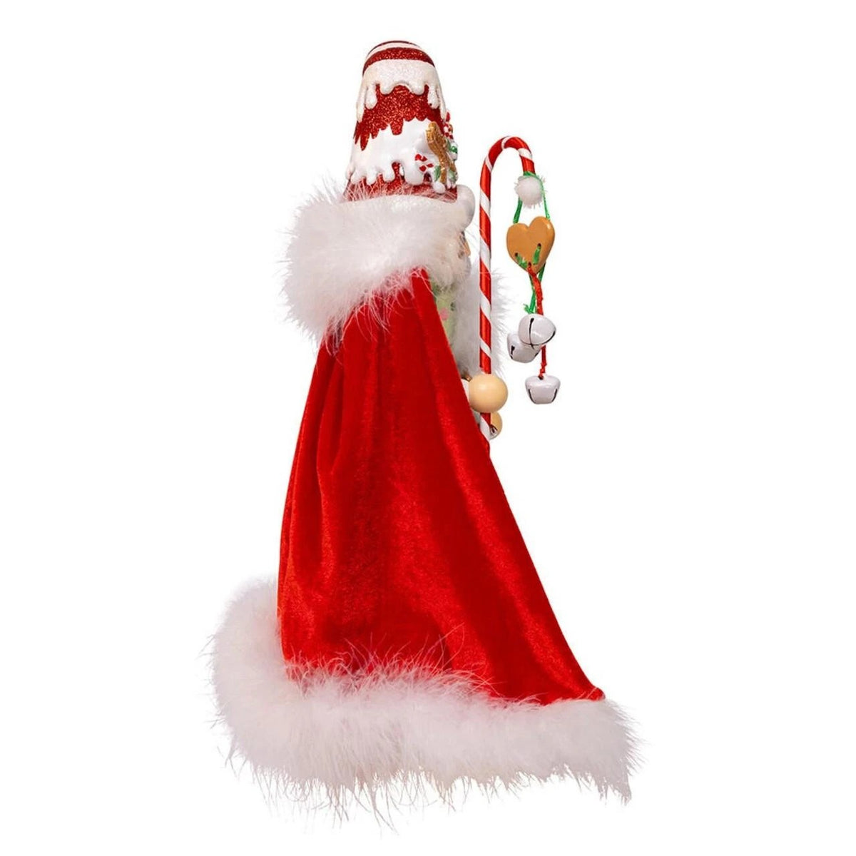 Side view of a 15-inch Gingerbread Candy Santa Nutcracker wearing a red velvet cape with white fur.