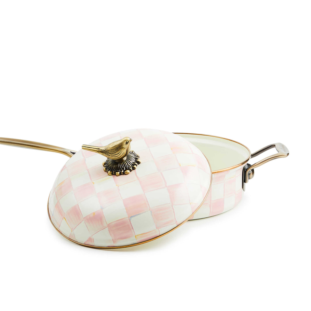 Rosy Check 3 Qt. Saute Pan with pink and white hand-painted checks and a bird-shaped brass knob.