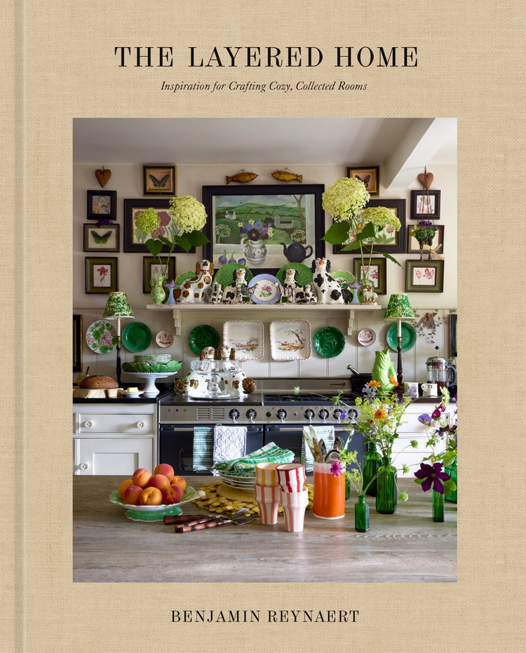 The Layered Home book cover by Benjamin Reynaert featuring a maximalist kitchen with many objects.