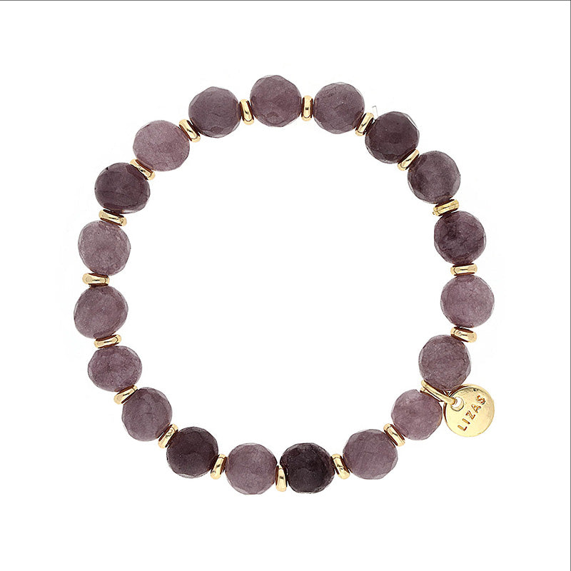 Lizas Beaumont bracelet with faceted purple natural stones and gold-toned spacers and logo charm.