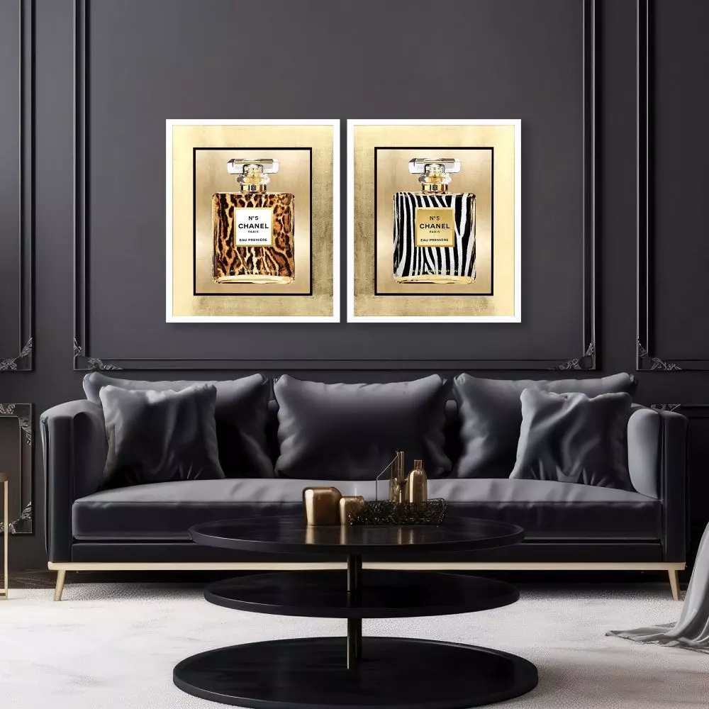 Framed wall art featuring a wild animal print with hand-applied gold leaf matting in white lacquered shadow box moulding.