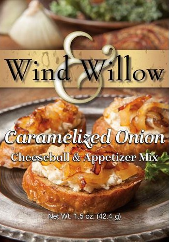 Open bag of caramelized onion savory cheeseball mix with visible dried herbs