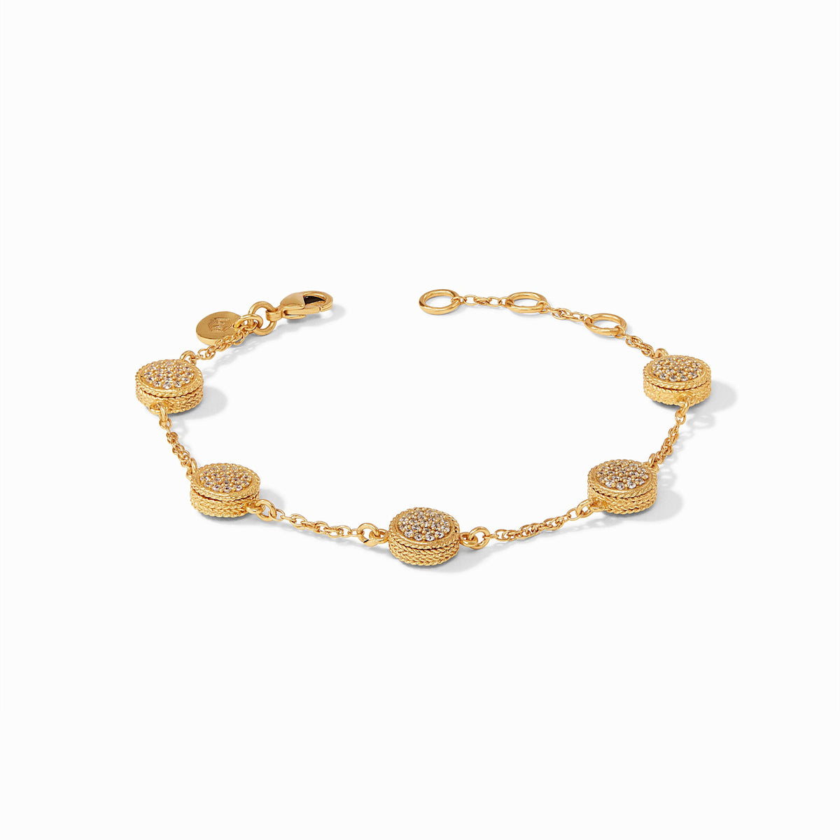 Gold plated delicate bracelet with five cubic zirconia pave stations on a slender adjustable chain.