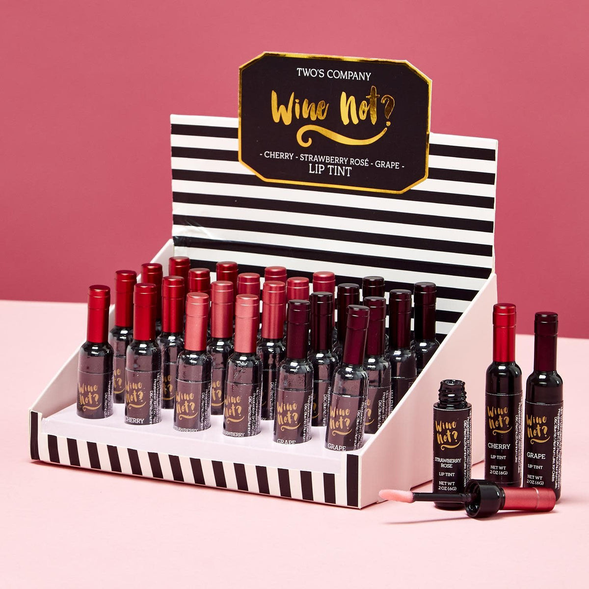Wine bottle-shaped lip gloss in deep red with a clear glass finish.