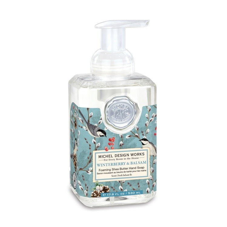 Foaming hand soap in a clear bottle with winterberry balsam liquid.