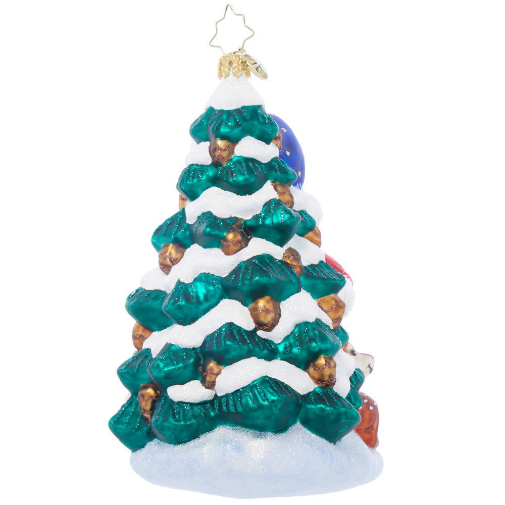 Back view of a Wintery Pals snowman figurine with black eyes and scarf.