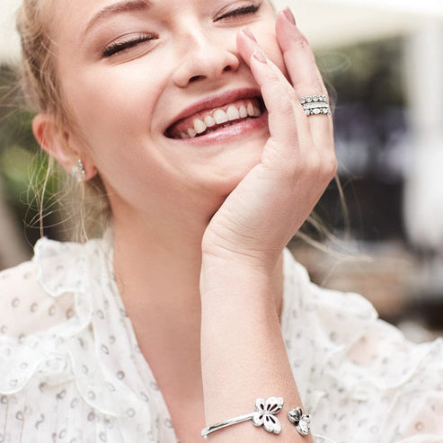 Silver plated Eternal Stack Ring featuring a Swarovski crystal accent with an 1/8 inch width.