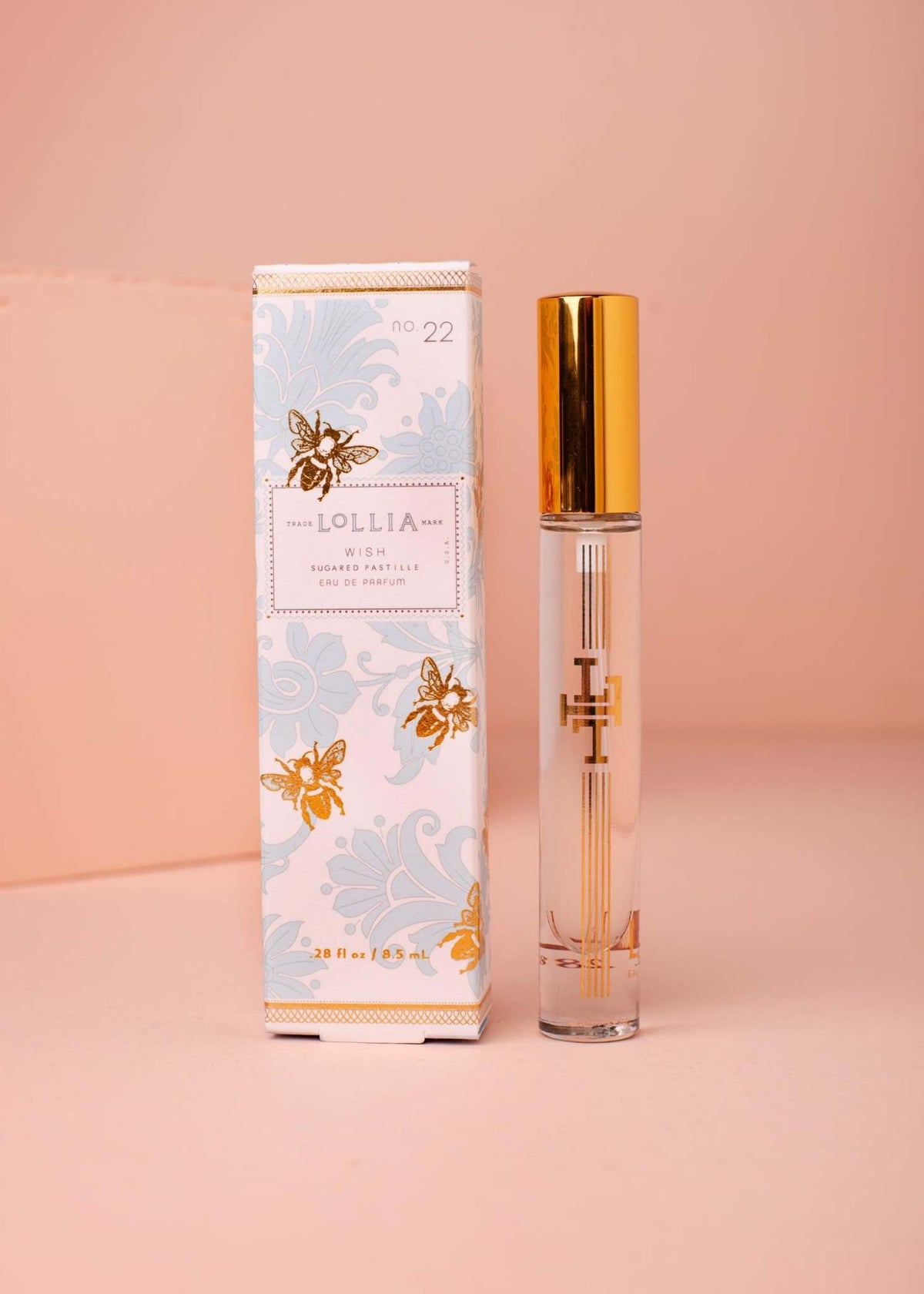 Travel Eau de Parfum in a gold-accented glass atomizer with gilded keepsake box