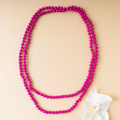 60-inch long necklace featuring clear crystal beads with a simple strand design.