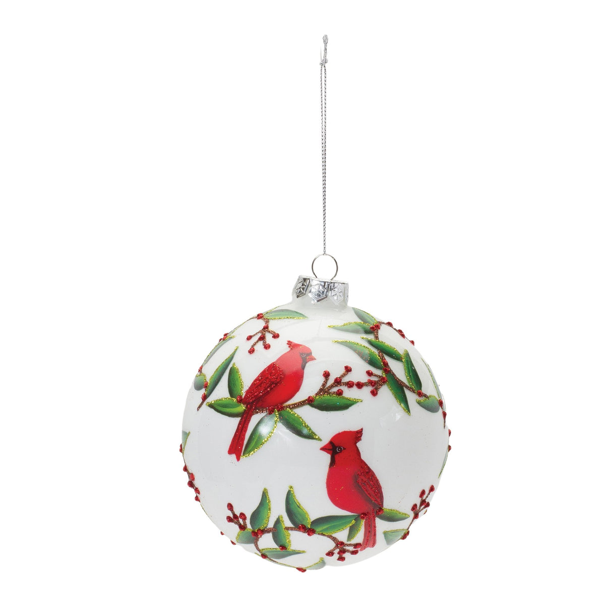White glass ball ornament featuring red cardinals on green branches with red berries.