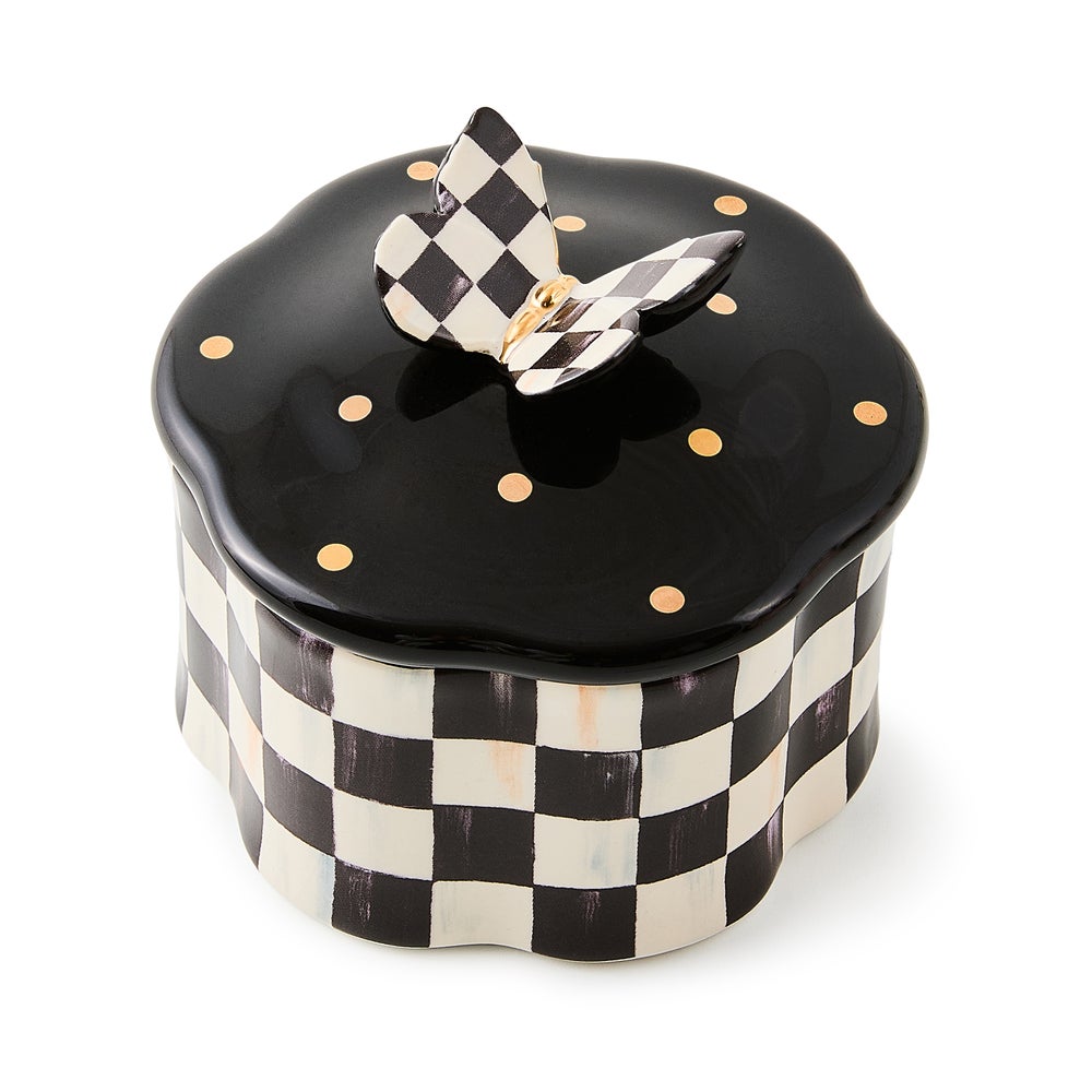 Hand-painted ceramic trinket box with black and white checks, a black lid with gold dots and butterfly