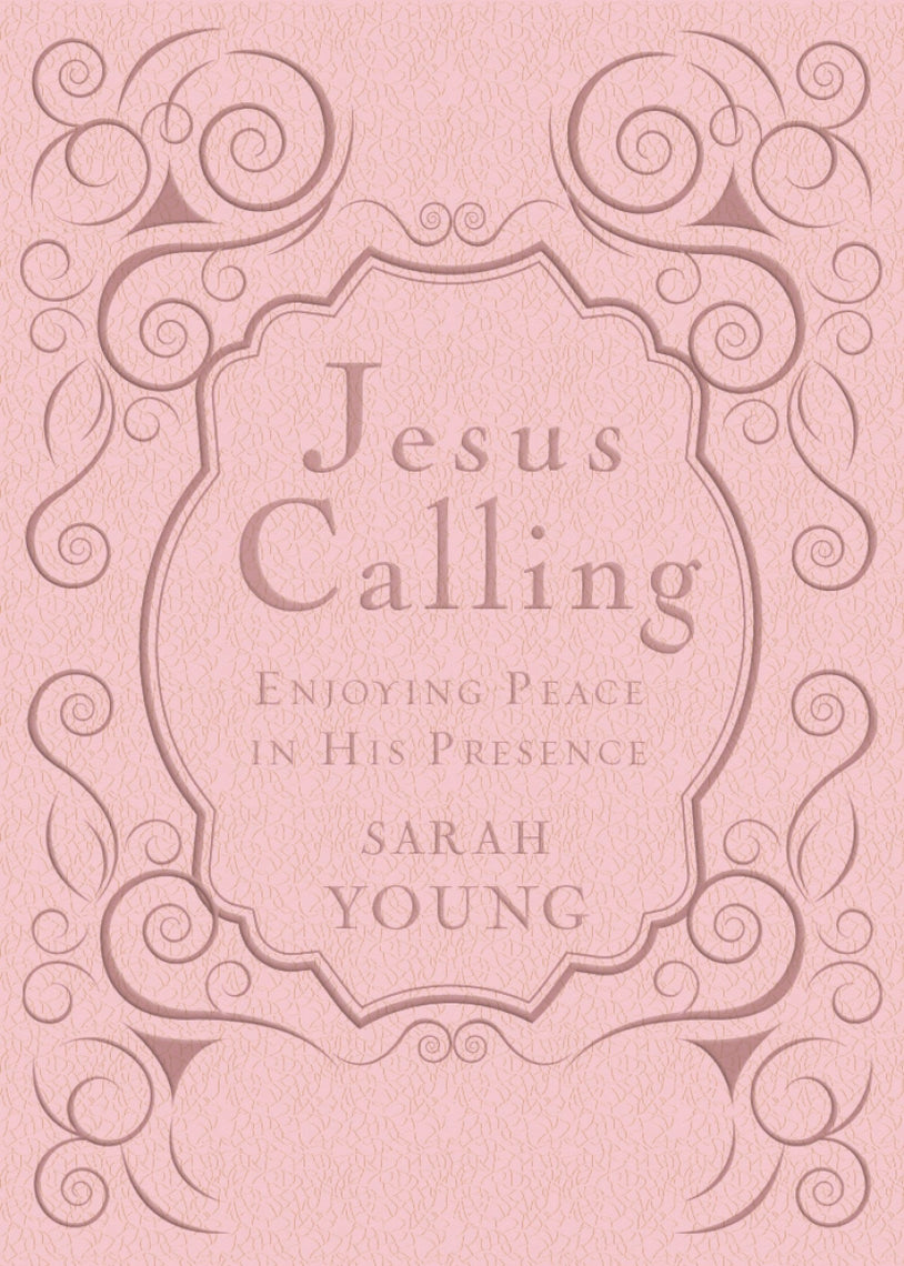 Pink cover of Jesus Calling Women's Edition by Sarah Young with ornate scrollwork and debossing.