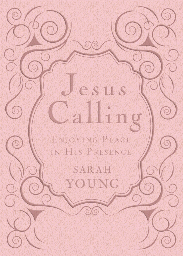 Pink cover of Jesus Calling Women's Edition by Sarah Young with ornate scrollwork and debossing.