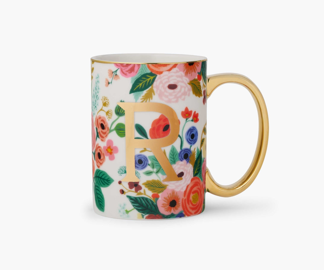 Garden Party porcelain mug with colorful floral patterns, a gold foil letter R, and a gold handle.