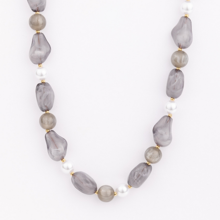 Zoe Necklace featuring chunky grey resin beads, white pearls, and gold-plated metal accents.