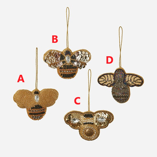 Three-inch fabric ornament with sequin bumble bee wings in yellow and black.