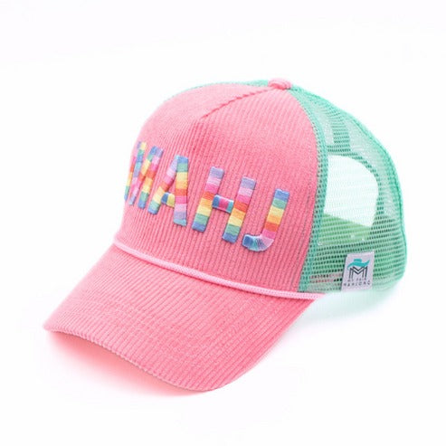 Pink corduroy trucker hat with rainbow MAHJ embroidery and a green mesh back.
