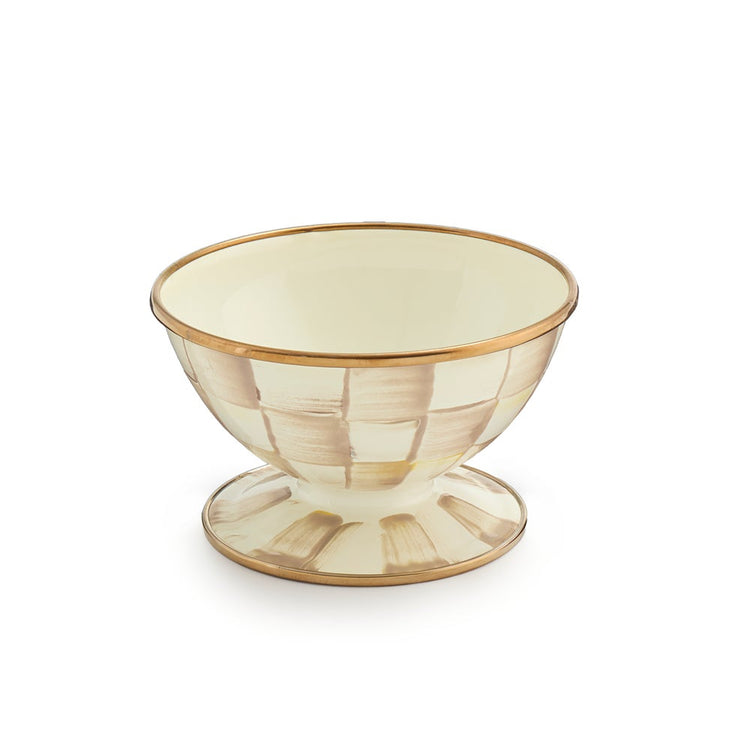Mocha Check Ice Cream Dish with hand-painted tan checks and a bronzed stainless steel rim.