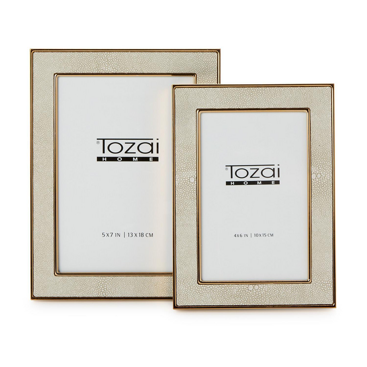 Cream faux shagreen photo frames with gold steel trim, available in 5x7 and 4x6 sizes.