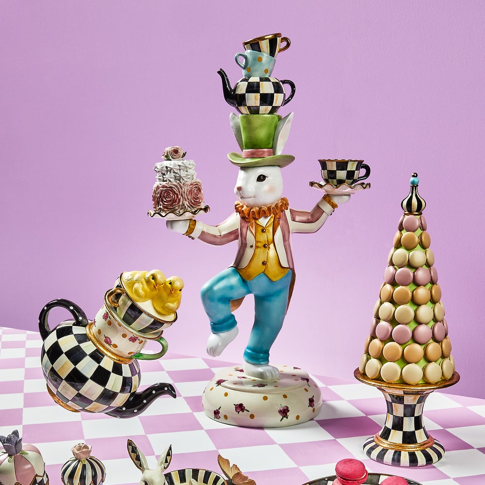 Rose Rabbit Centerpiece featuring a white rabbit balancing a cake, teacups, and a teapot.