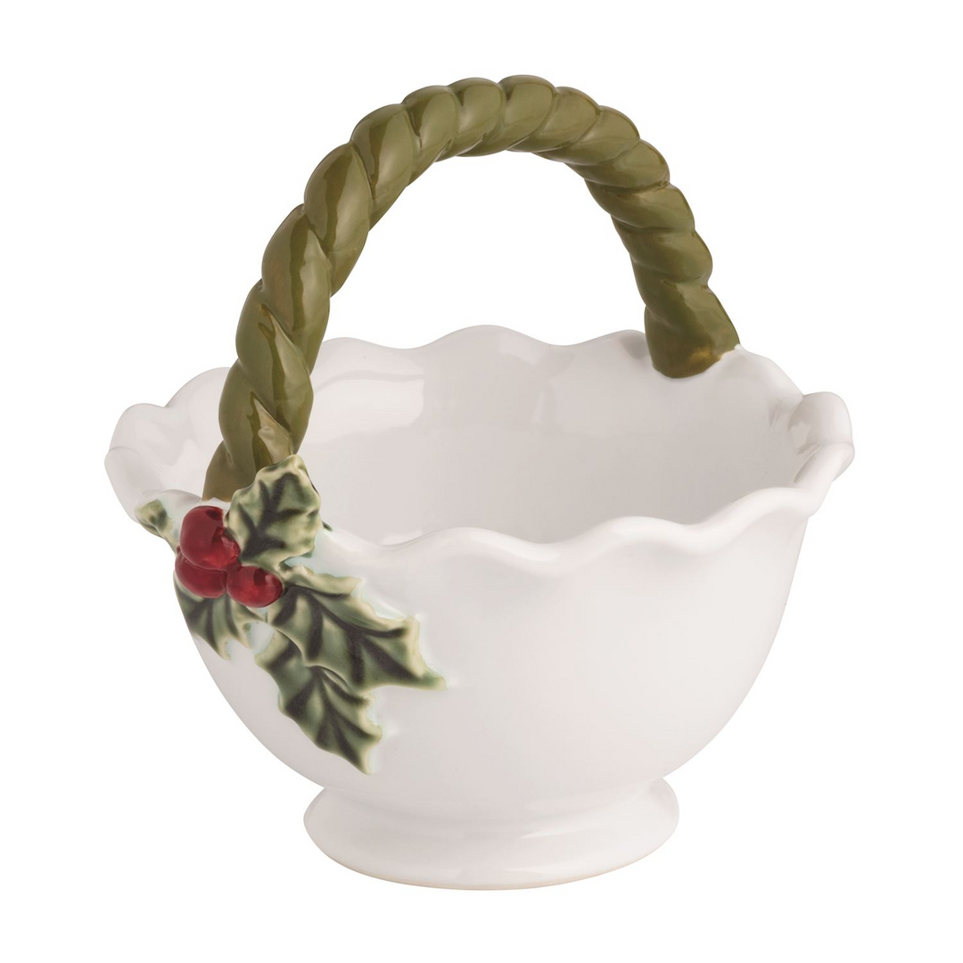 White stoneware candy bowl with a green twisted handle and holly berry attachment.