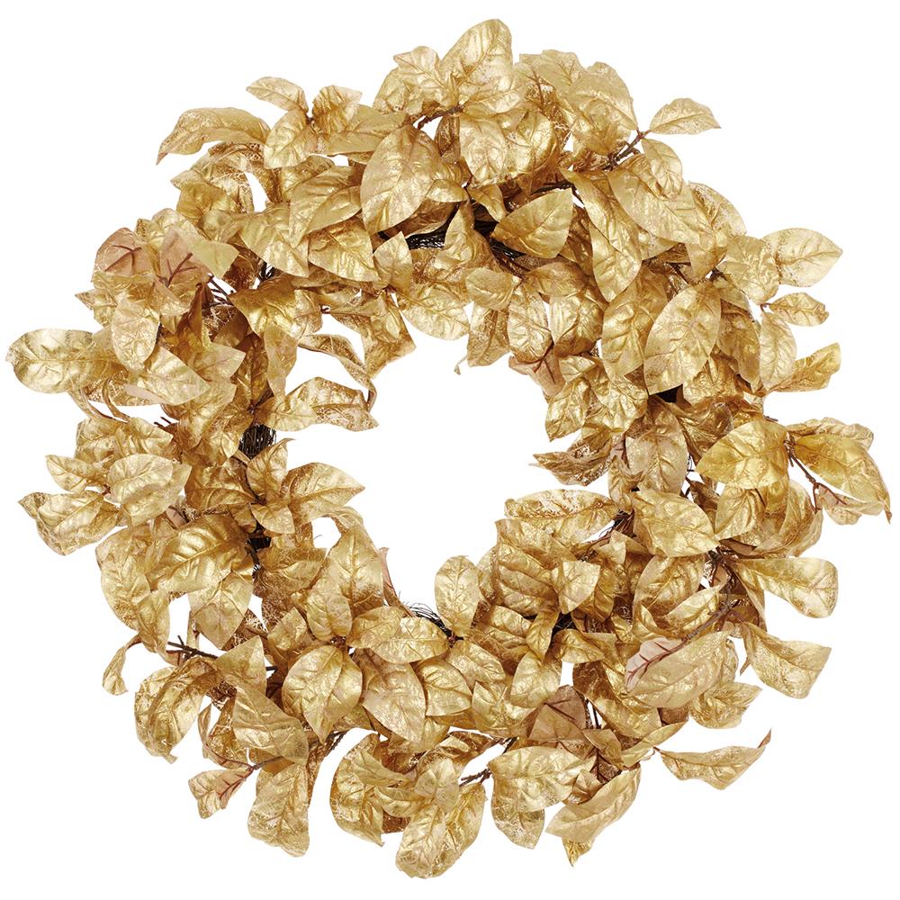 24-inch metallic gold magnolia leaf wreath made of fabric and plastic on a vine base.