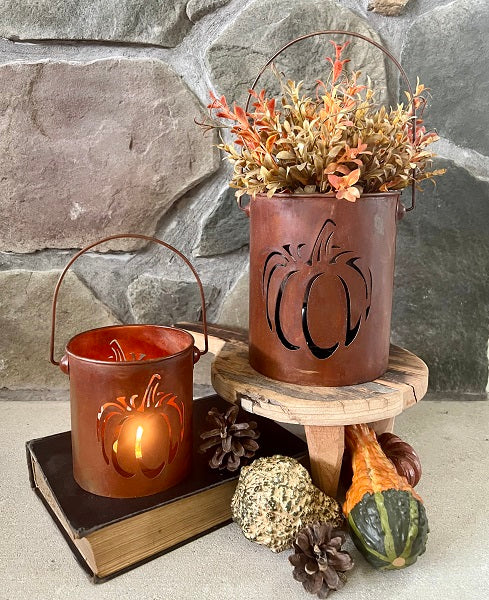Rust-colored pumpkin-shaped bucket with a textured surface.