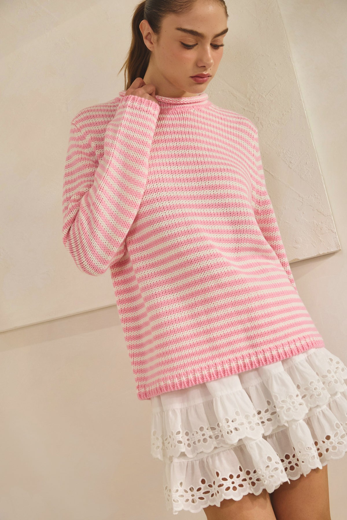 Oversized Selene stripe knit sweater in soft gray with dropped shoulders, ribbed cuffs, and side slits.
