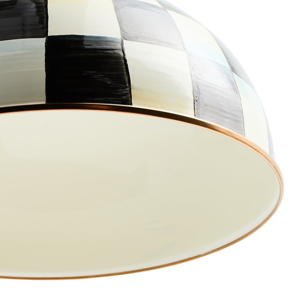 Close-up of a Courtly Check dome pendant lamp showing hand-painted black and white checks.
