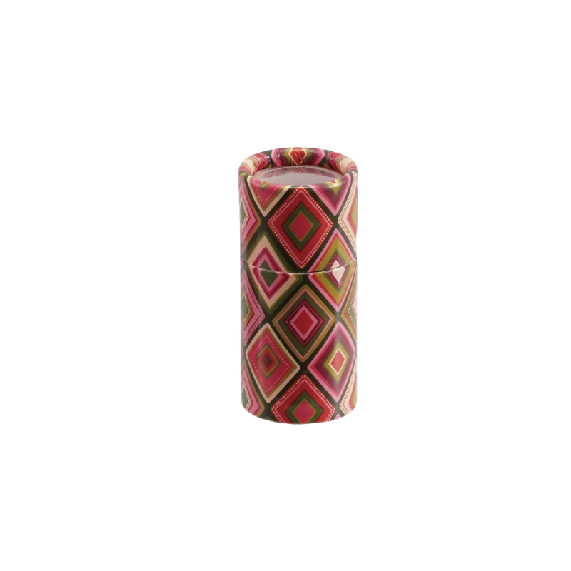 Multicolor paper tube matchbox with a pink and green diamond holiday pattern.