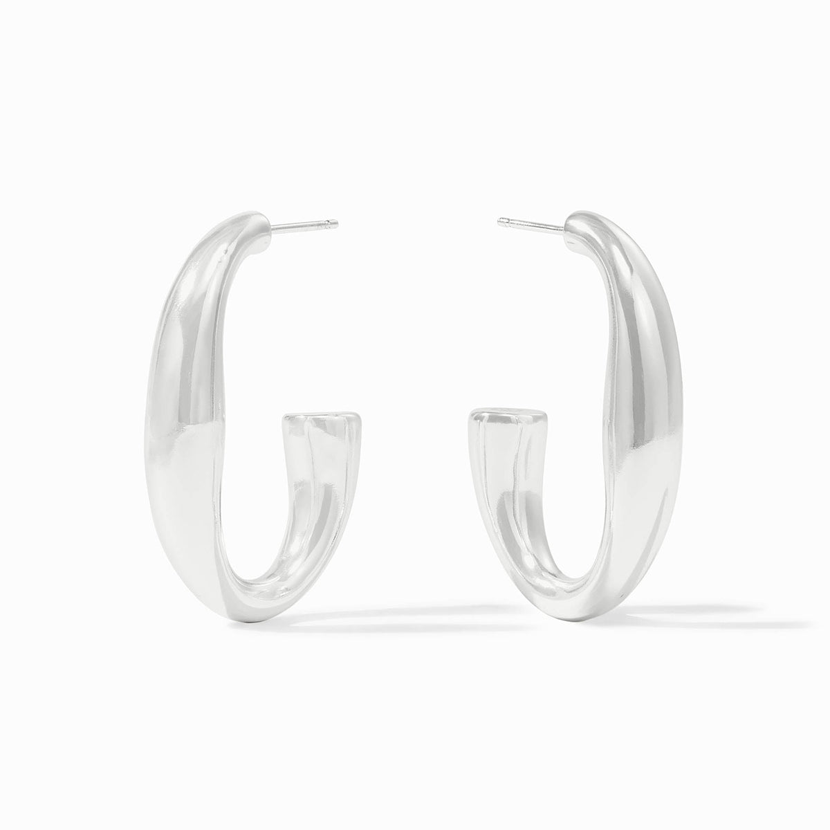 A pair of silver Laguna Hoop earrings with a thick, tapered design and post backings.