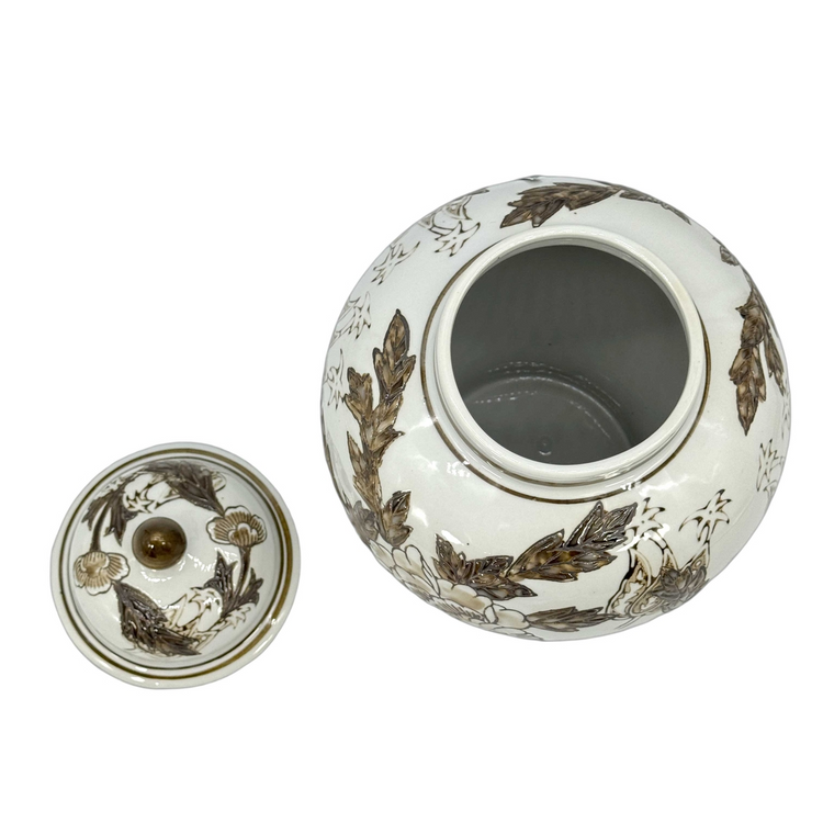 Top view of a 12-inch white and brown floral ceramic chinoiserie jar with its lid removed.
