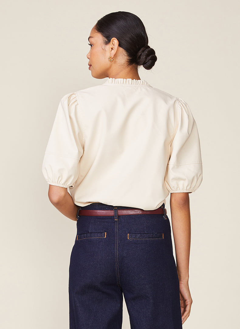 Kacey vegan leather blouse in black with viscose panels featuring a relaxed silhouette.