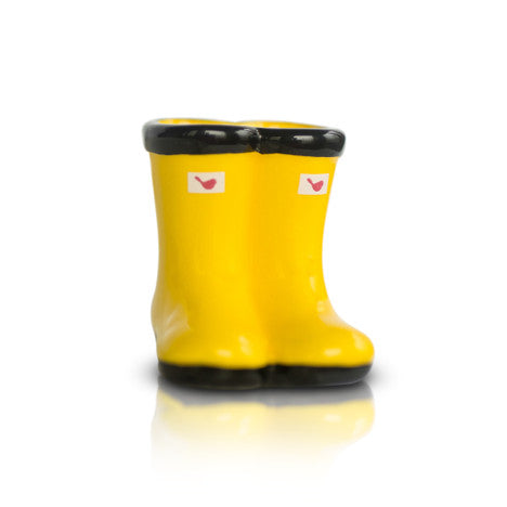 St Jude Jumpin' Puddles yellow ceramic rain boot planter with black trim and red bird logo.