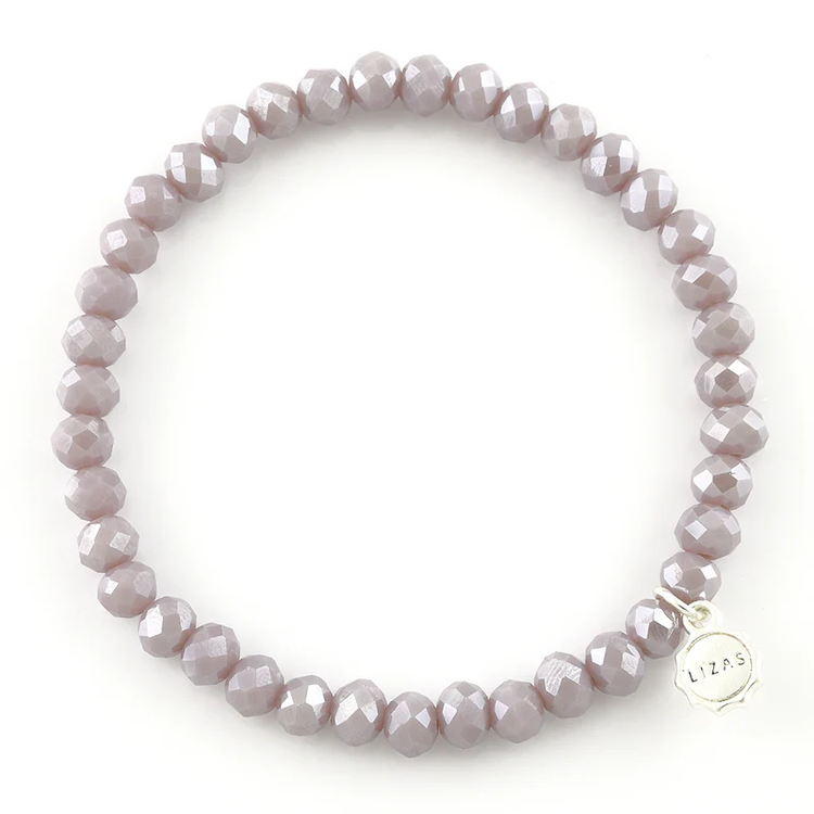 Lizas Quadro Big Bright Colours Bracelet featuring faceted light purple beads and a silver charm.