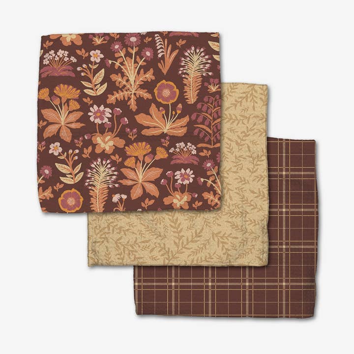 Set of three waffle weave dishcloths in white with single-sided prints featuring a subtle pattern.