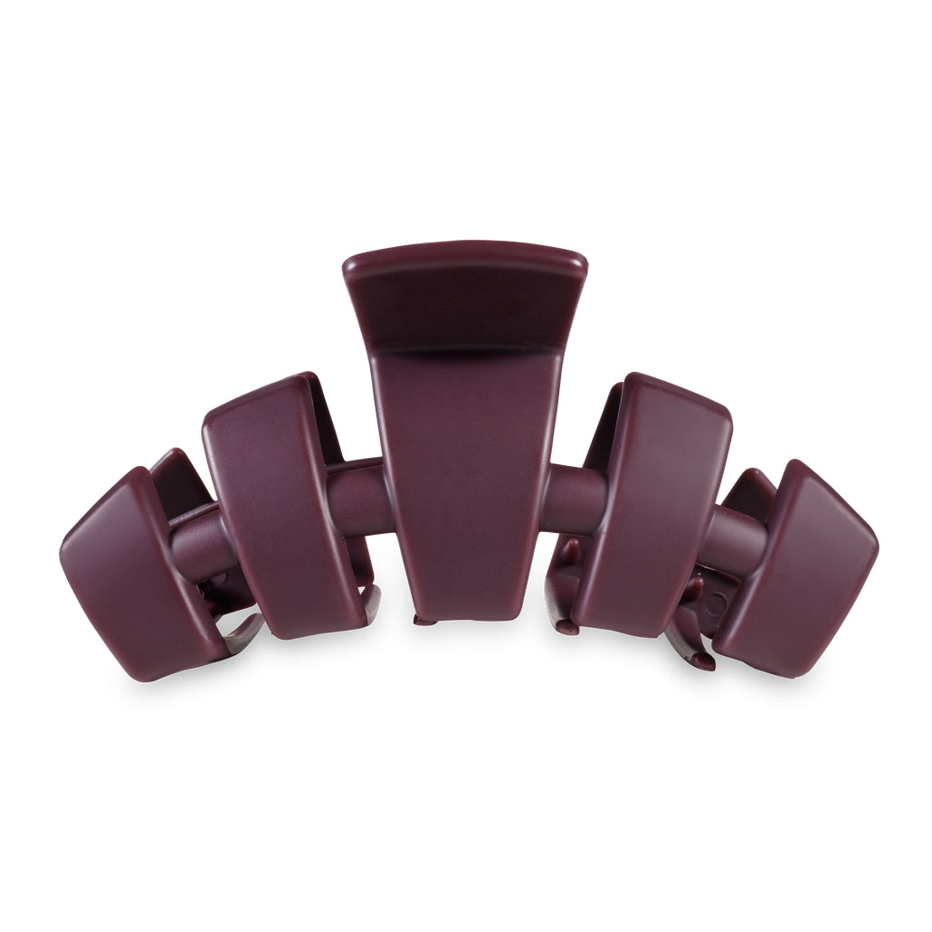 Large classic hair clip with bendable teeth in a neutral tone.