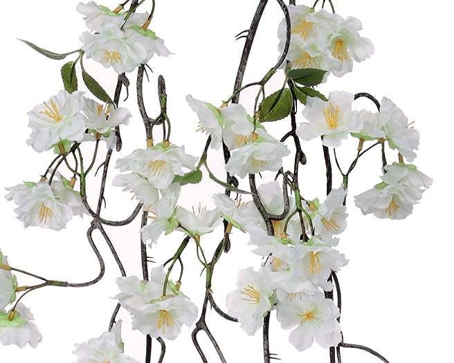 Triple cherry blossom garland with pink floral patterns on a natural branch background