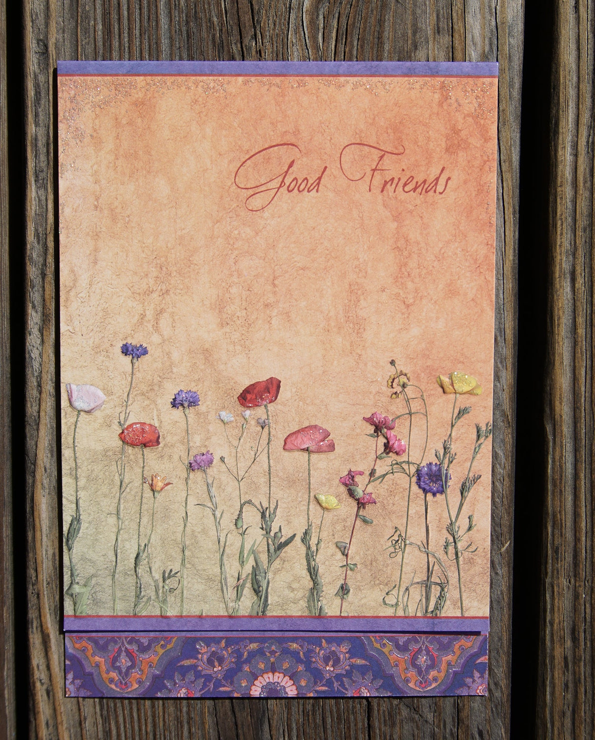 Birthday Wild Flowers card with glitter foil emboss die-cut floral pattern on white background
