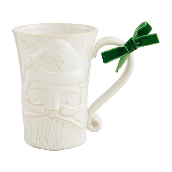 White milk glazed textured stoneware mug with raised antique wash motif.