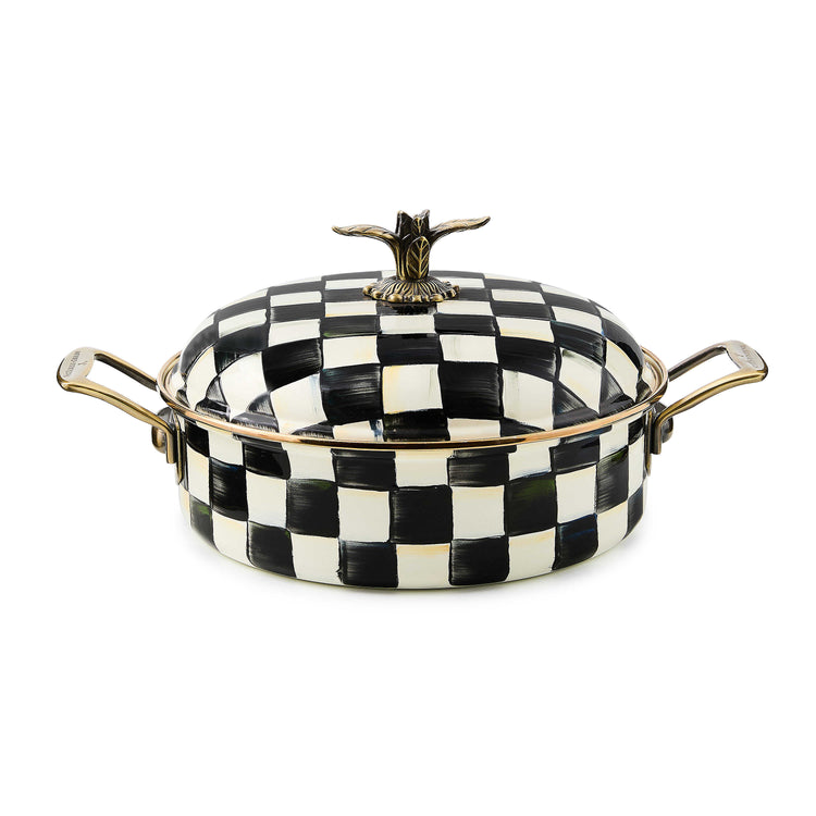 Black and white checkered enamel 5 quart casserole dish with brass handles and a bird-shaped knob.