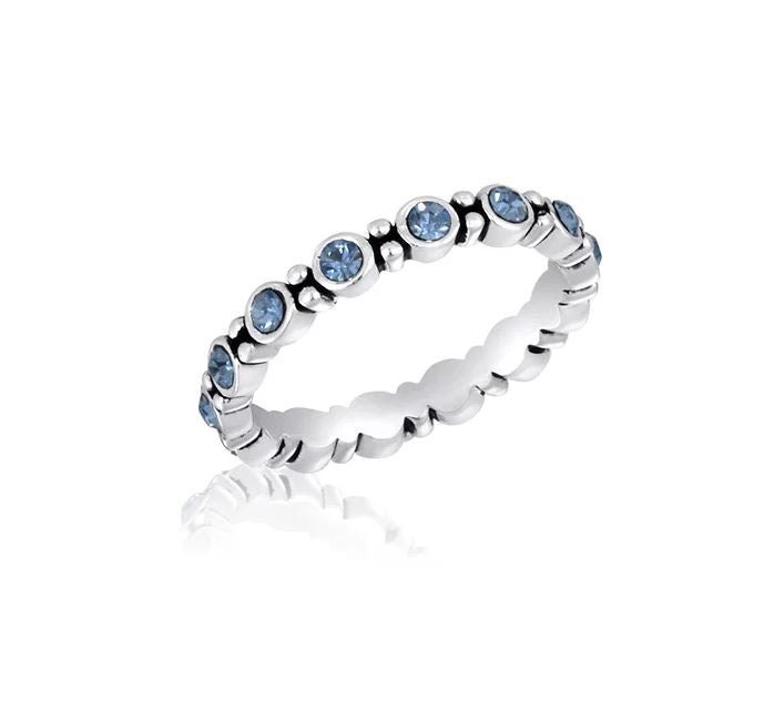 Blue cubic zirconia round stack ring with a polished band.