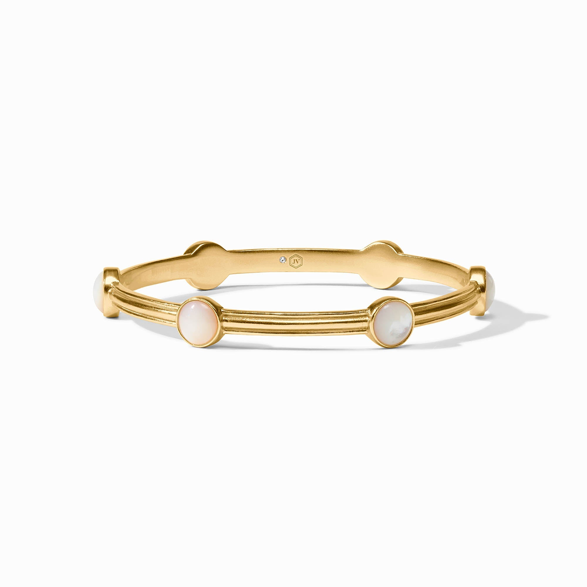 Gold Essex Stone Bangle with four round white stones and a ridged band design.
