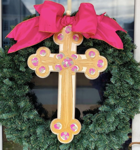 Hand-painted MDF cross with a satin bow top, gold back, artist signature.