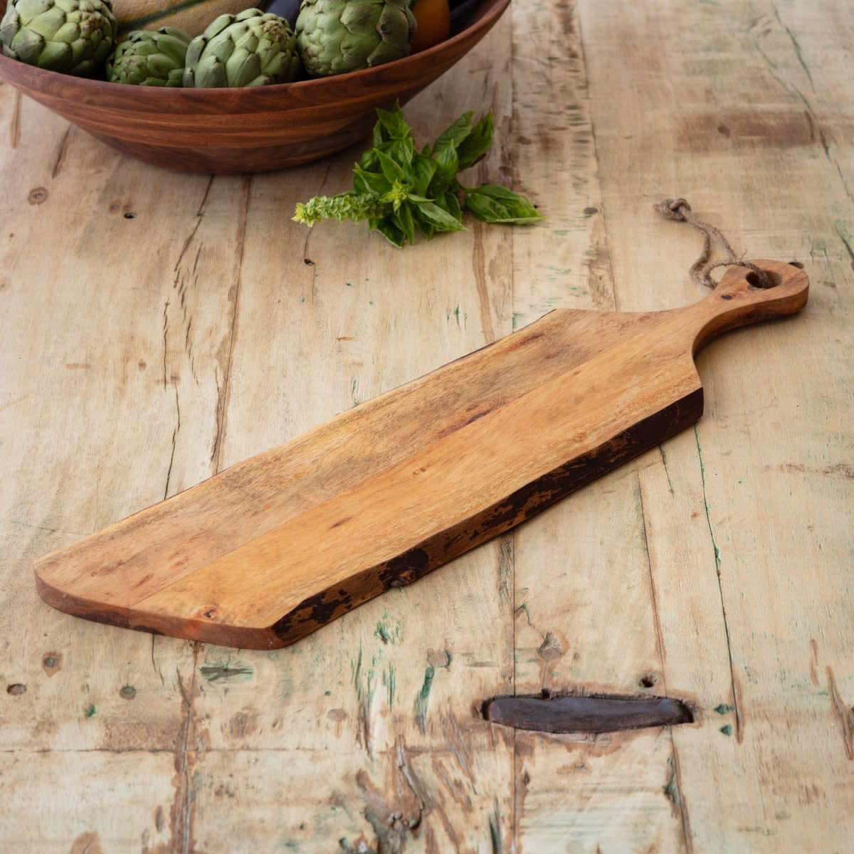 Stained wooden live edge baguette board with natural grain pattern