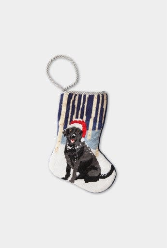 Black Labrador retriever needlepoint stocking with woodland foliage pattern on velvet backing