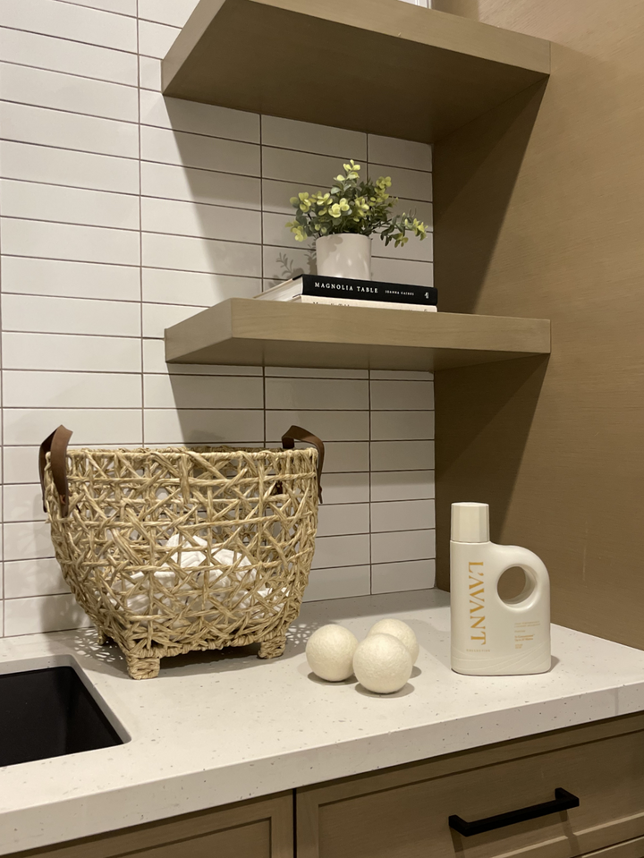 Set of natural wool dryer balls in a neutral beige tone.