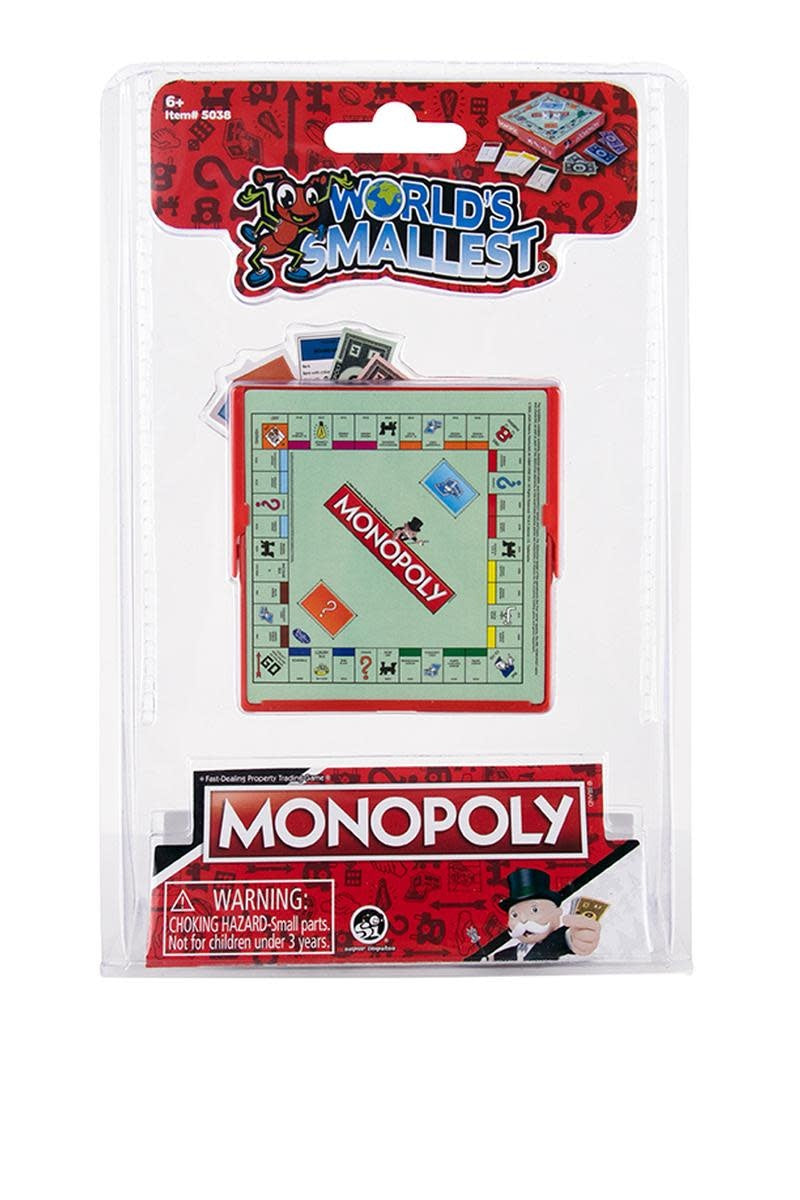 Pocket-sized Monopoly game board with miniature tokens, houses, hotels, cards, money, and dice inside a compact carry box.