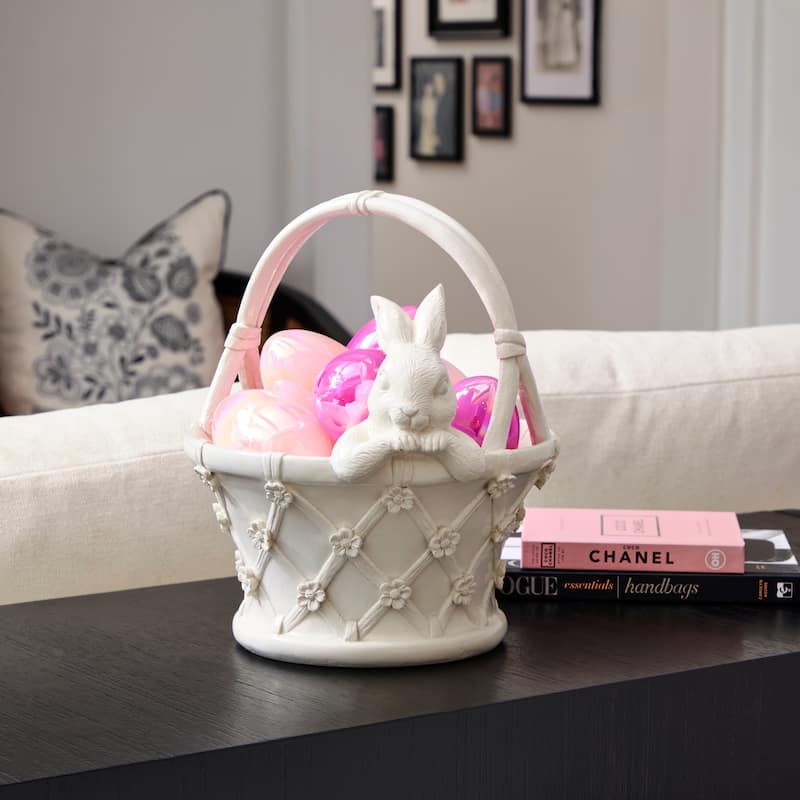 Resin floral basket with bunny featuring textured flower patterns and glossy finish in woven style