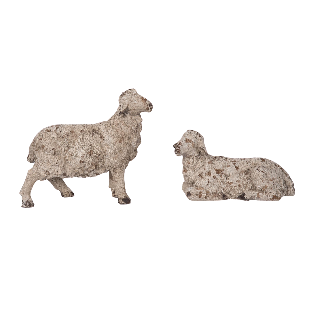 Resin decorative lamb figurine in natural tone with smooth sculpted curves.